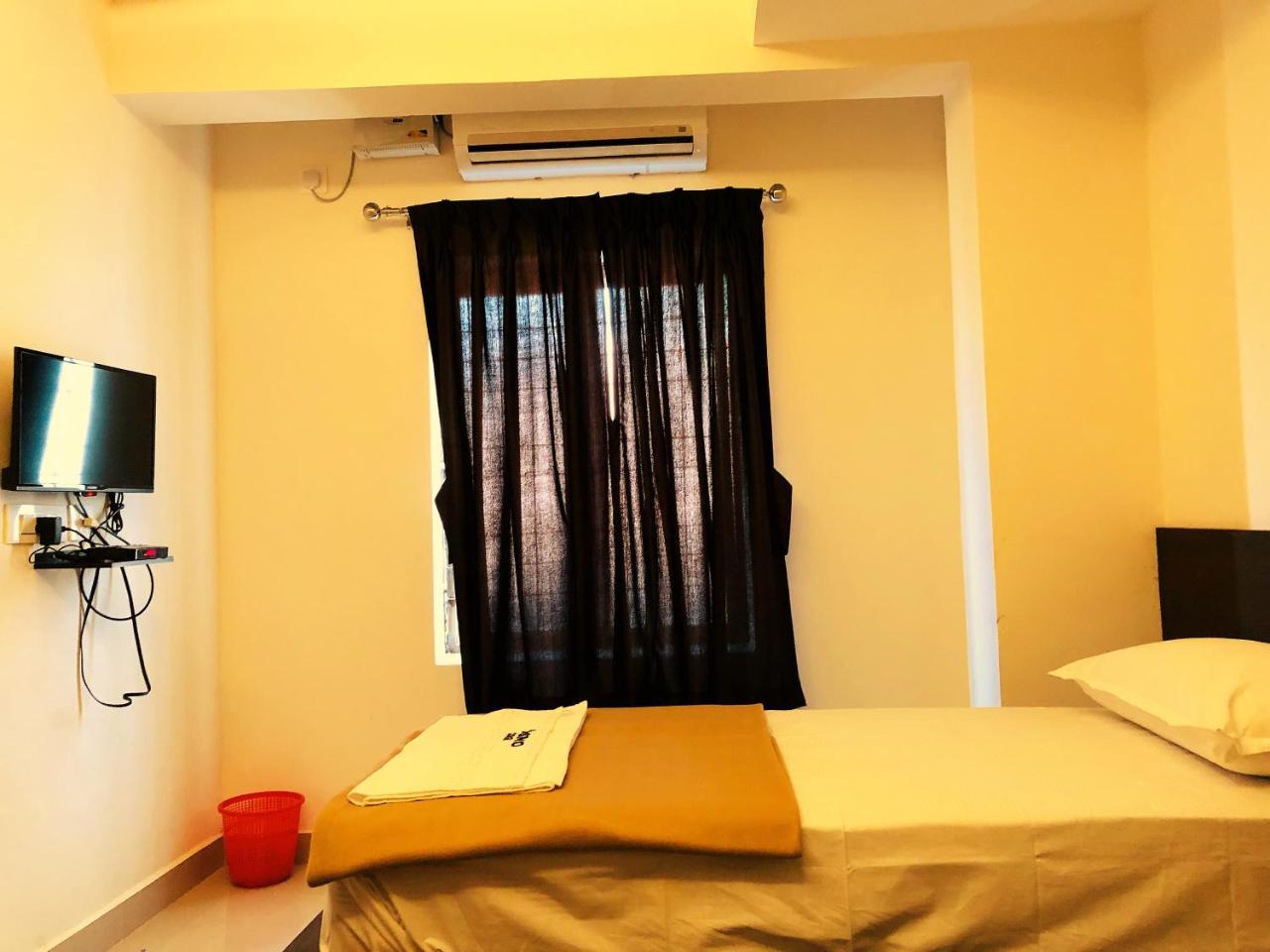 Cosmo Lodge Mangalore Bagian luar foto
