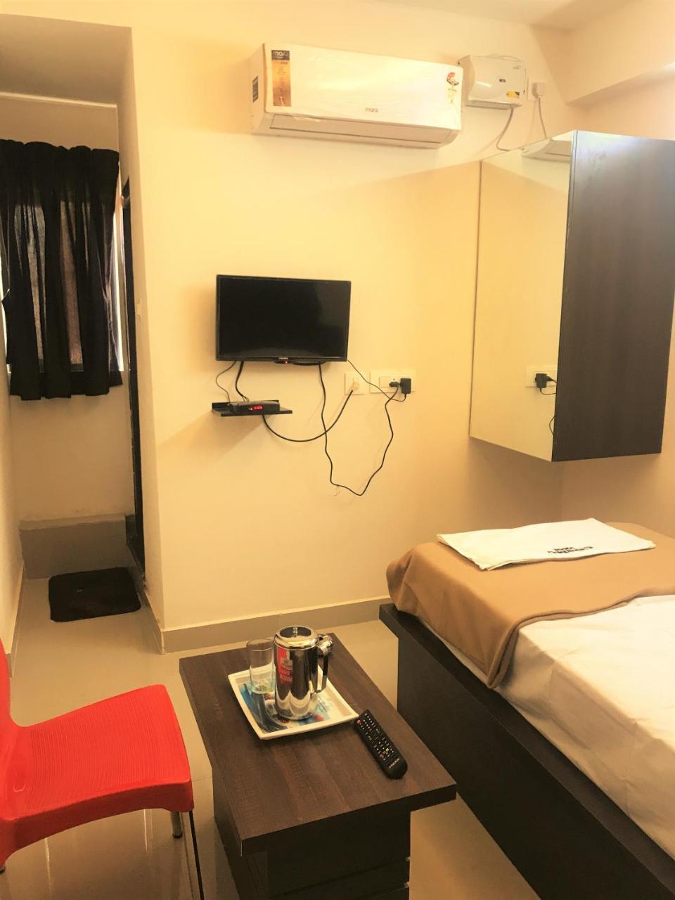 Cosmo Lodge Mangalore Bagian luar foto