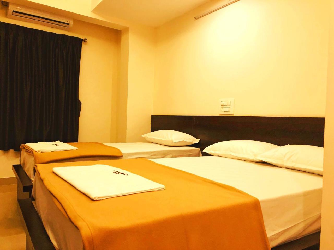 Cosmo Lodge Mangalore Bagian luar foto