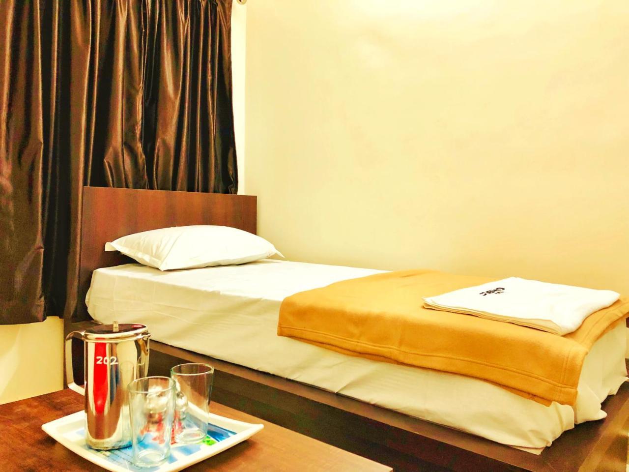 Cosmo Lodge Mangalore Bagian luar foto