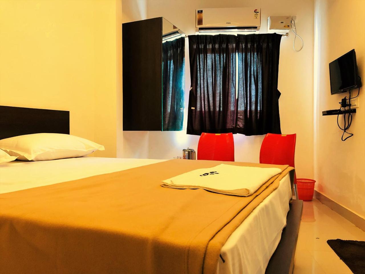 Cosmo Lodge Mangalore Bagian luar foto