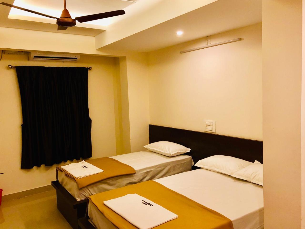 Cosmo Lodge Mangalore Bagian luar foto